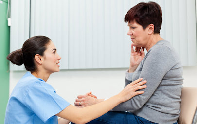 nurse comforting a patient in pain nurse comforting a patient in pain