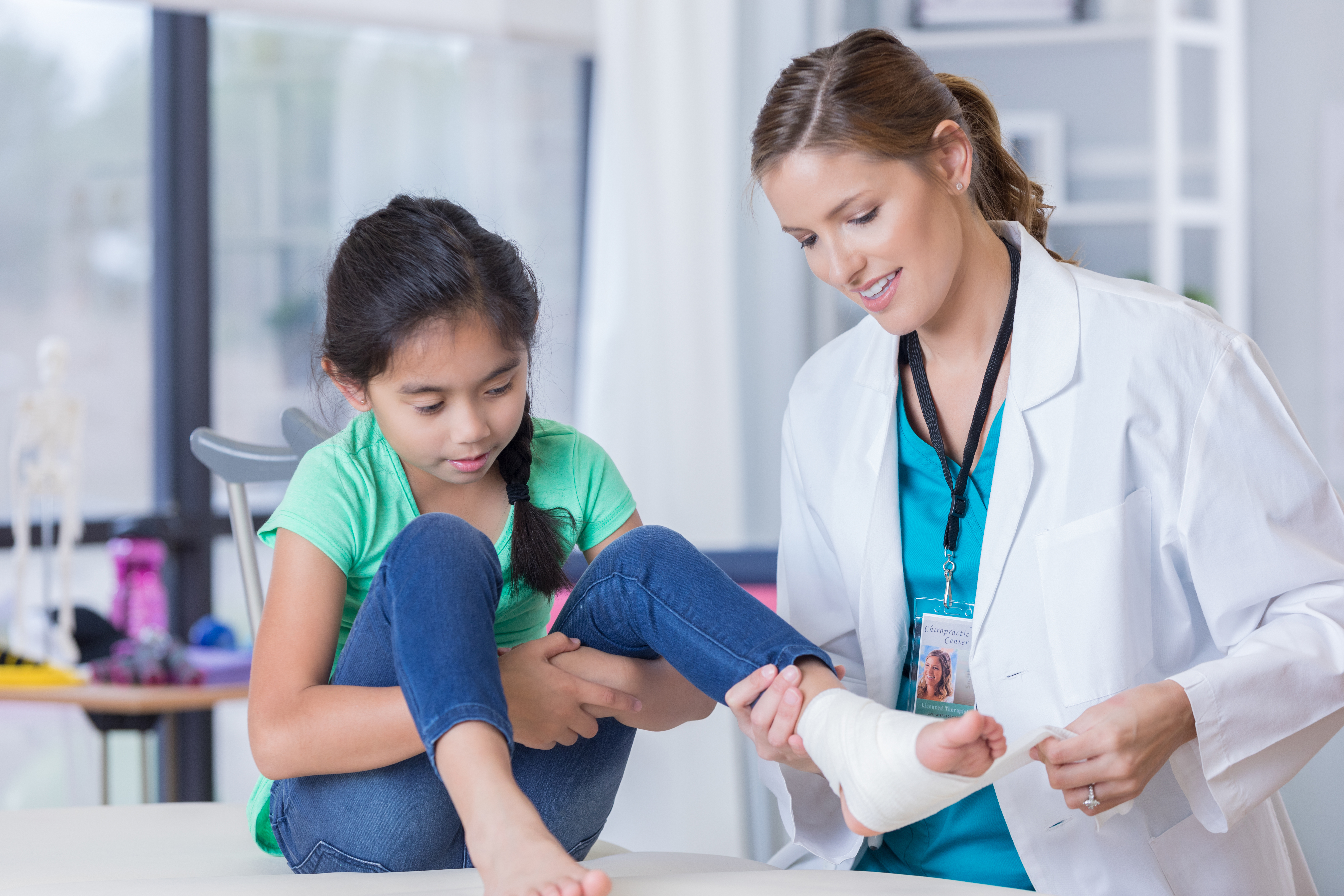 Clinician working in a hospital healthcare environment Clinician working in a hospital healthcare environment