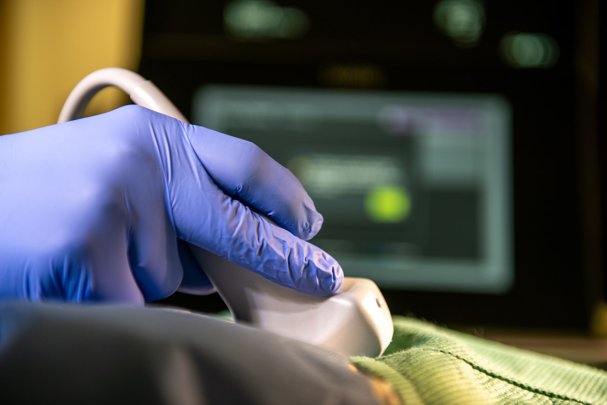 Medical sonographer checking patient Medical sonographer checking patient
