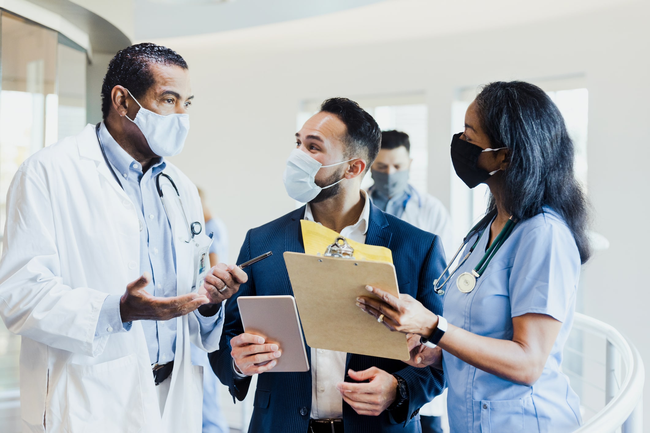 Hospital leadership talking to employees Hospital leadership talking to employees