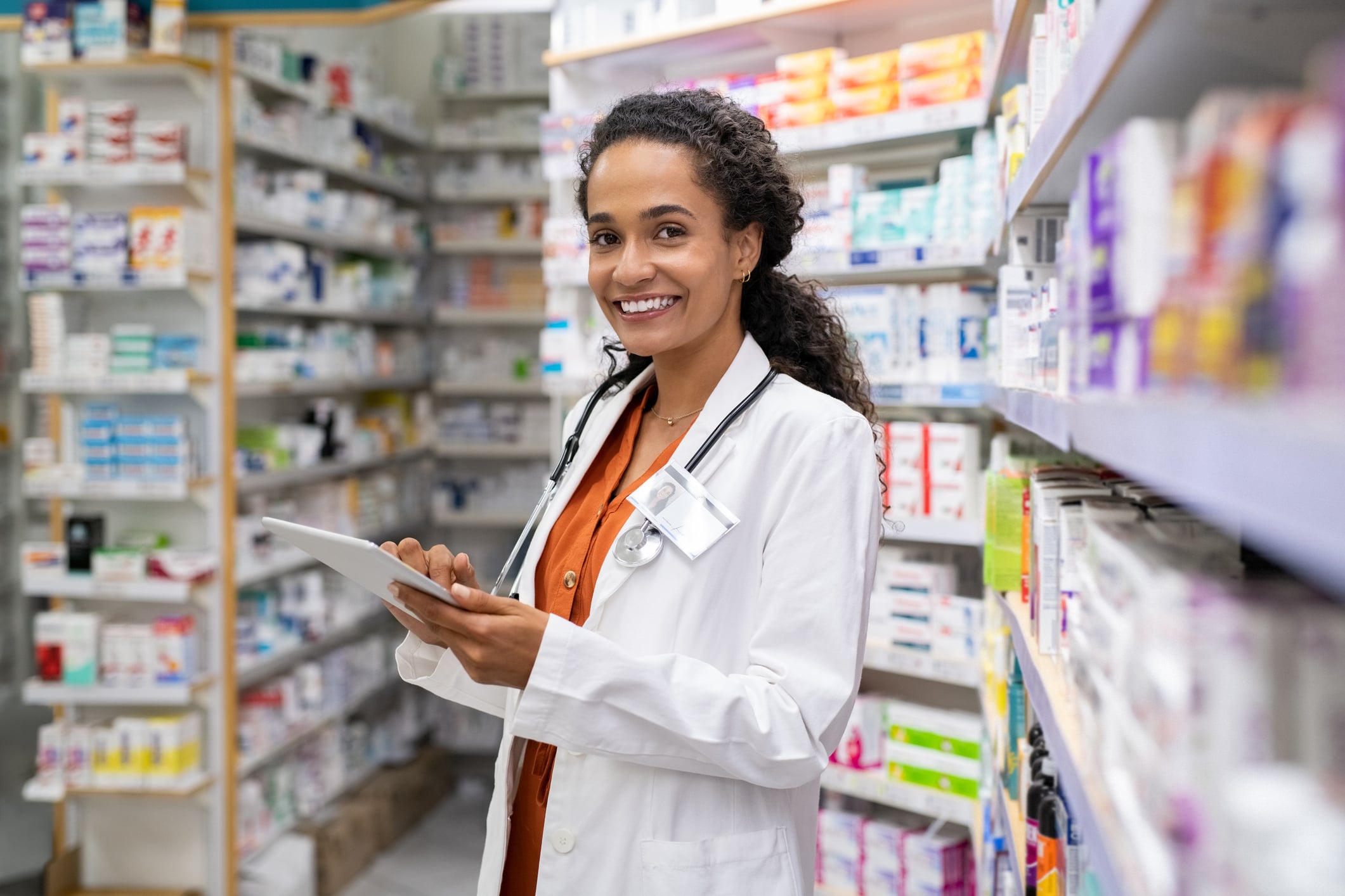 Pharmacist standing in pharmacy Pharmacist standing in pharmacy