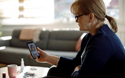 woman on virtual call with doctor woman on virtual call with doctor