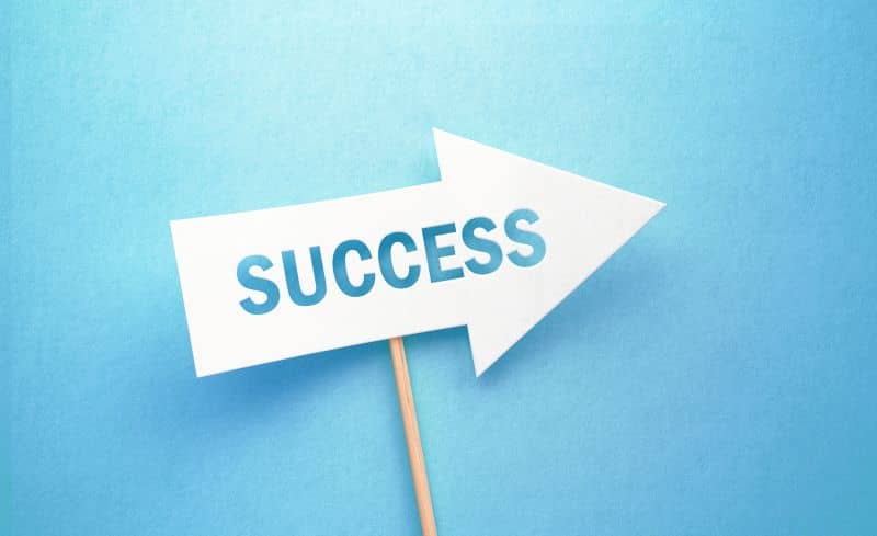 Success Written White Arrow On Blue Background Success Written White Arrow On Blue Background