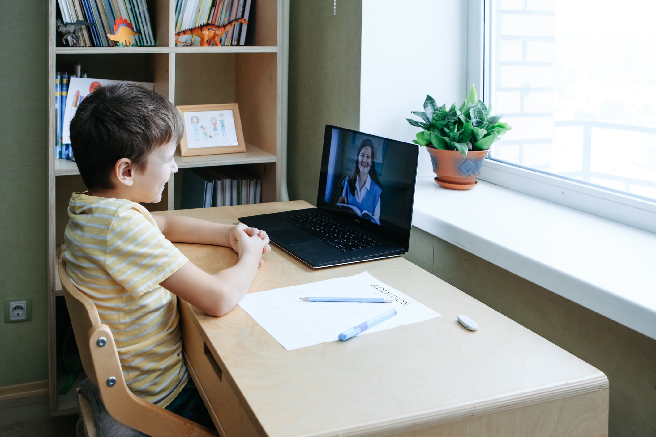 young boy in school teletherapy session young boy in school teletherapy session