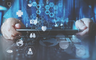 person on computer compiling healthcare data person on computer compiling healthcare data