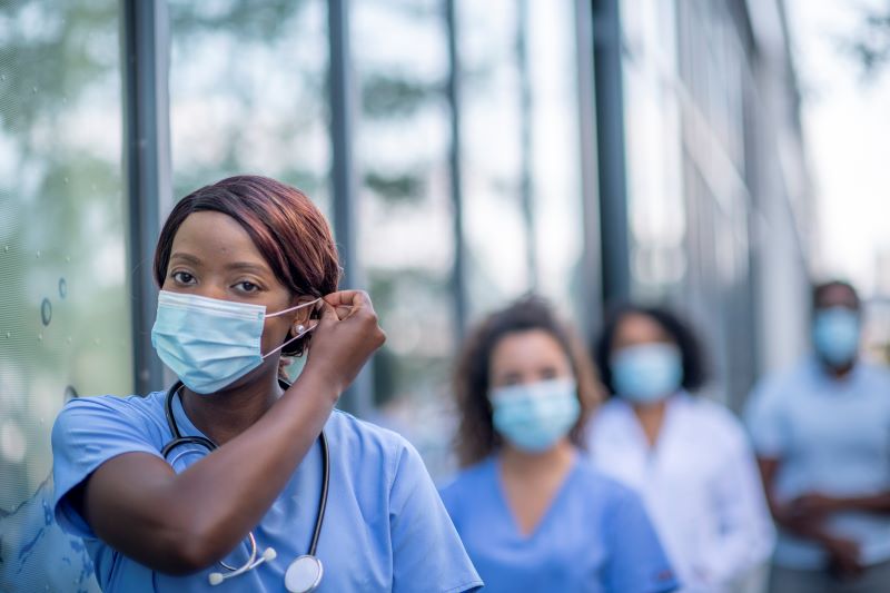 group of nurses during flu season group of nurses during flu season