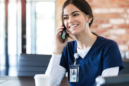 Travel nurse on the phone with a patient Travel nurse on the phone with a patient