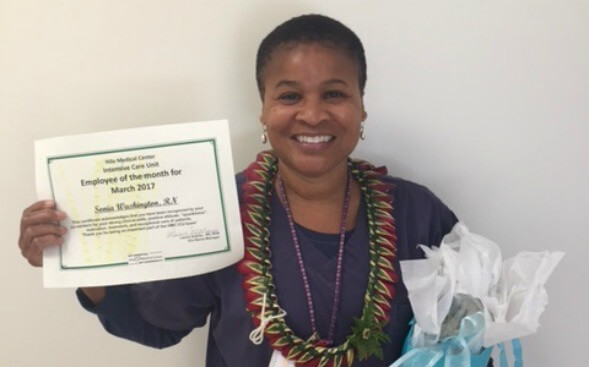 Sonia Washington holding her award Sonia Washington holding her award