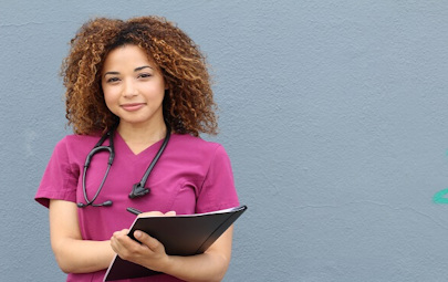 Travel nurse with a clipboard in her hand Travel nurse with a clipboard in her hand