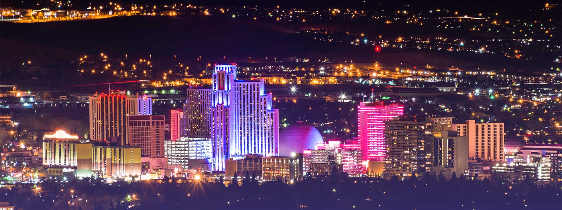 Nighttime skyline of a lit up Las Vegas Strip