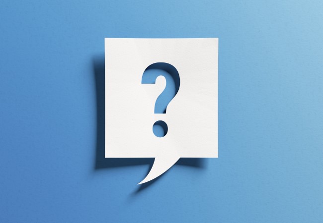 Question mark sitting on a blue background
