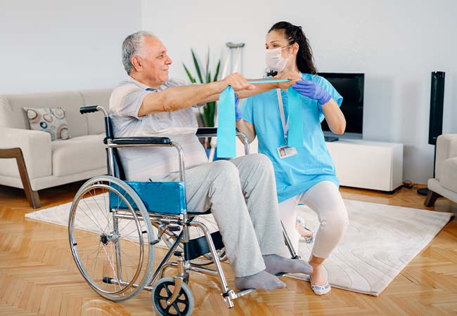 Nurse working with elderly patient Nurse working with elderly patient