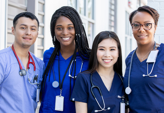 A group of smiling travel nurses A group of smiling travel nurses